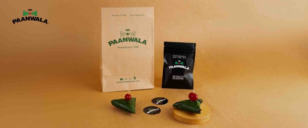 Mr.Paanwala packaged paan products with fresh paan servings.