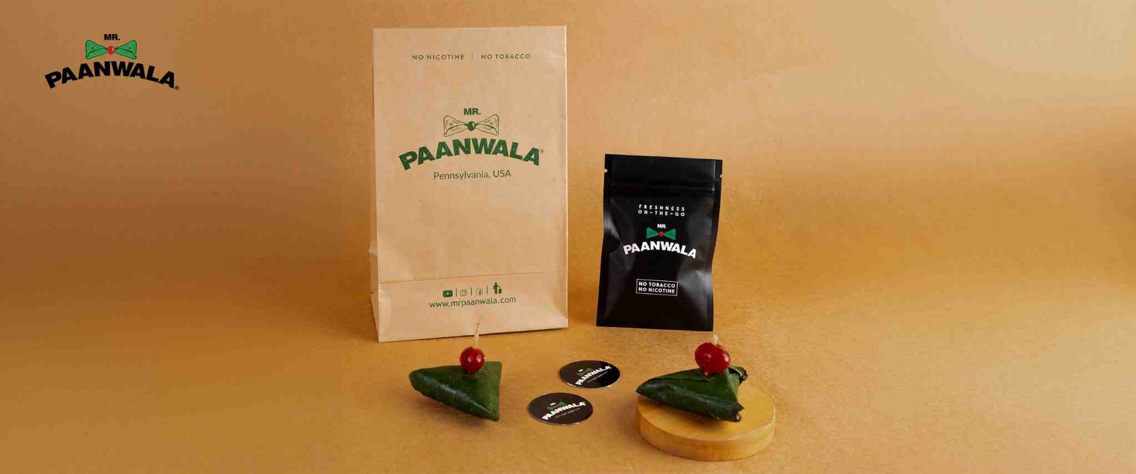 Mr.Paanwala packaged paan products with fresh paan servings.