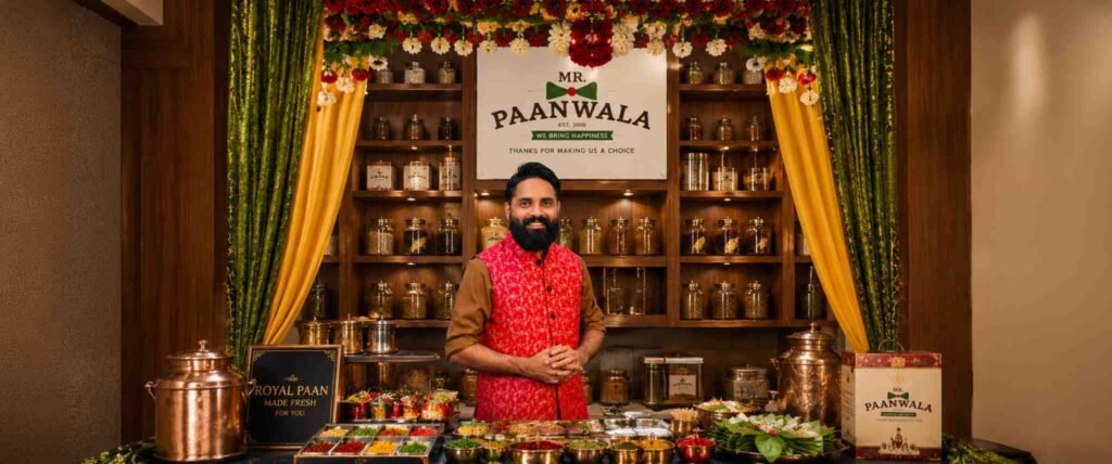 Mr.Paanwala founder presenting a traditional paan counter with ingredients and products.